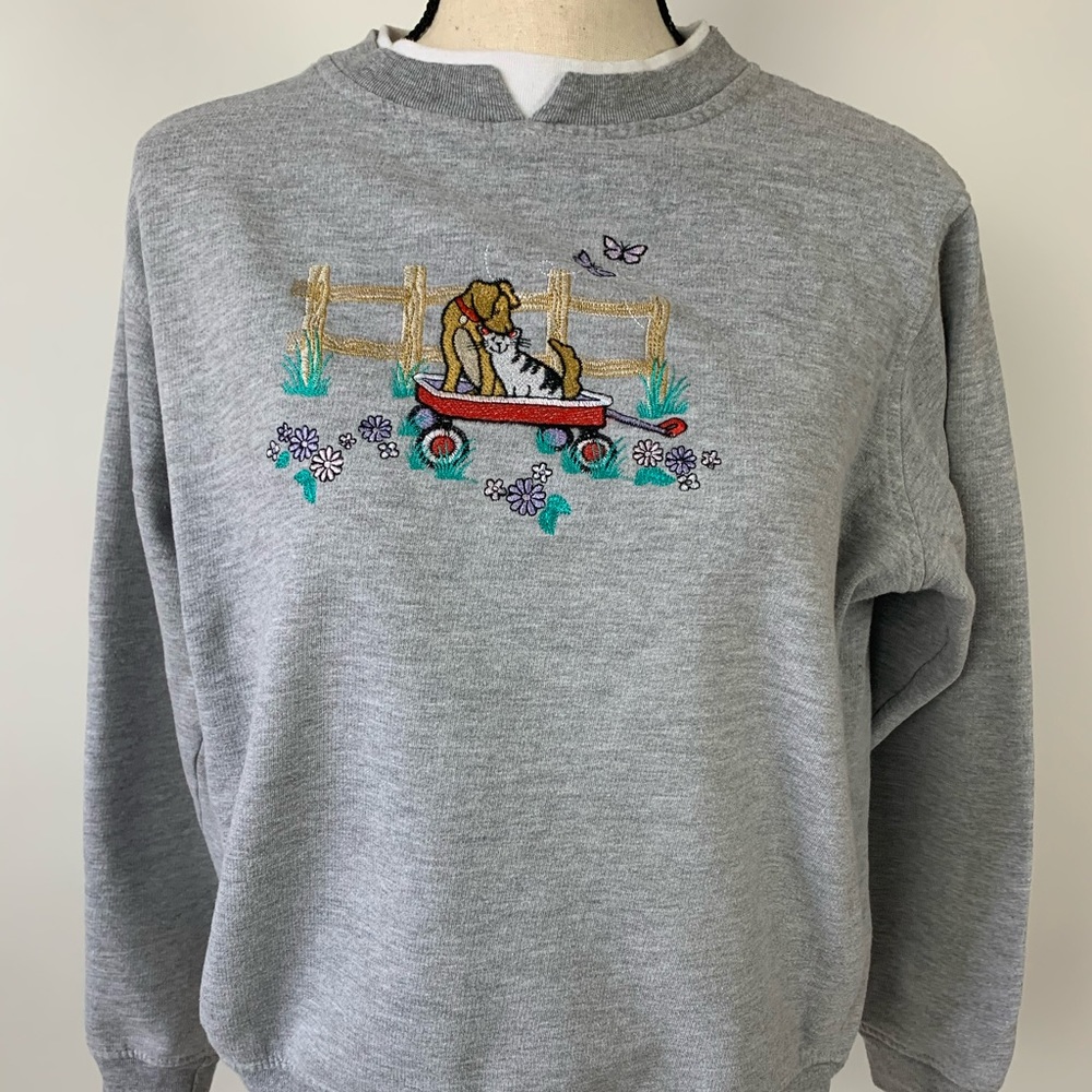gray crewneck with embroidered animals